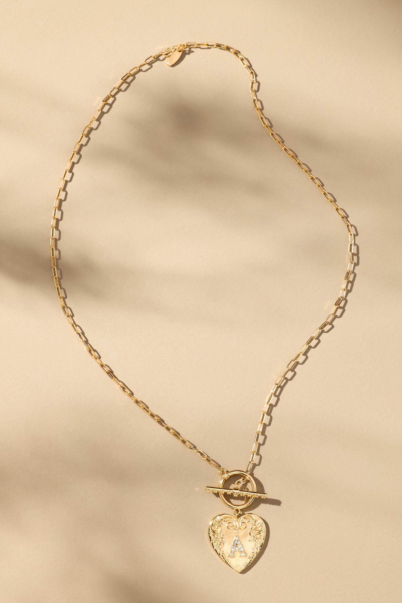 アンソロ★モノグラムハートトグルネックレス モノグラム・ハート・トグル・ネックレス | Anthropologie ホーム