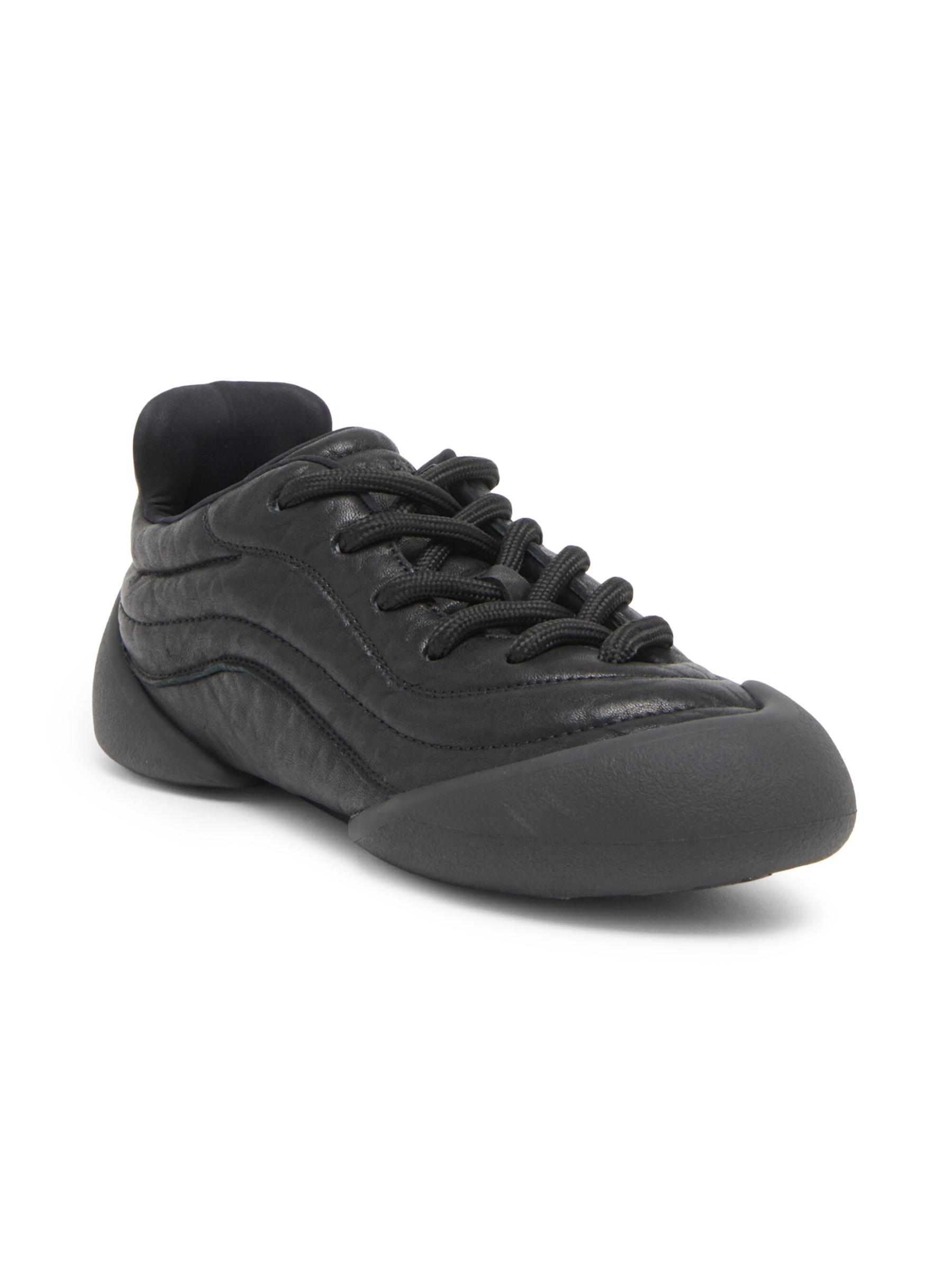 Shop McQueen - Flexion Leather Low-Top Sneakers | Saks Fifth