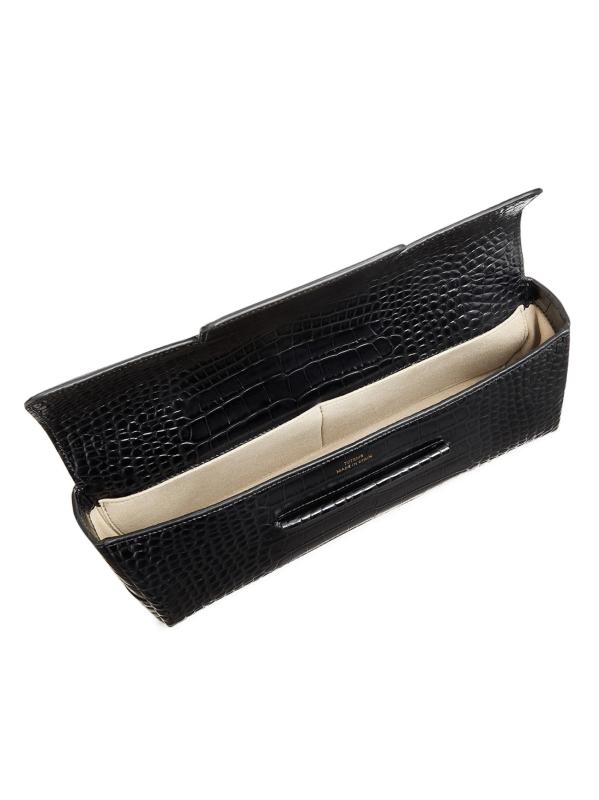 #4: حقيبة تي-كلاتش ناعمة بنقشة جلد التمساح - أسود
