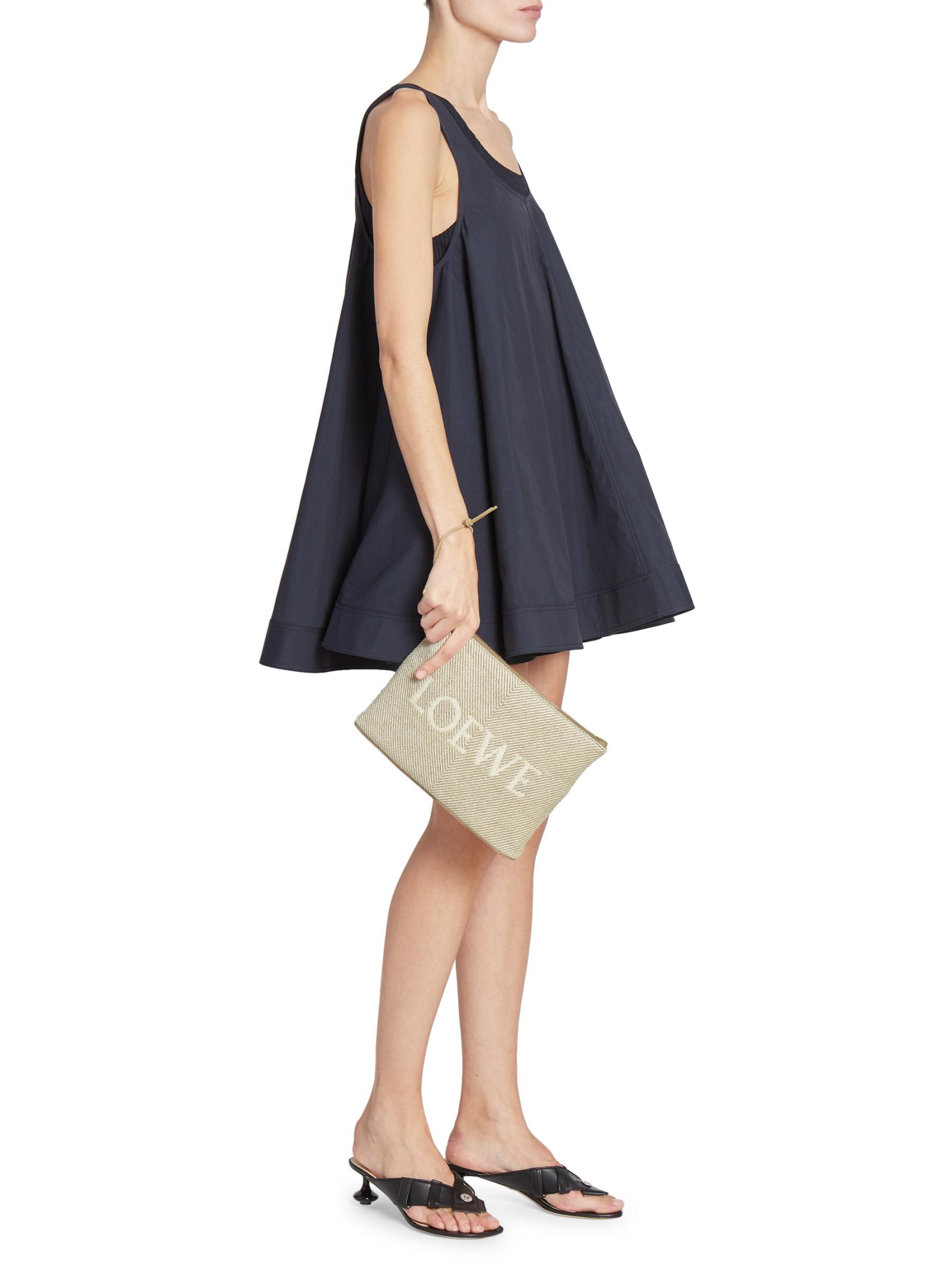 【LOEWE】Stripe cape in linen and cotton Shop Loewe - Oblong Logo Striped Linen-Cotton Pouch | Saks
