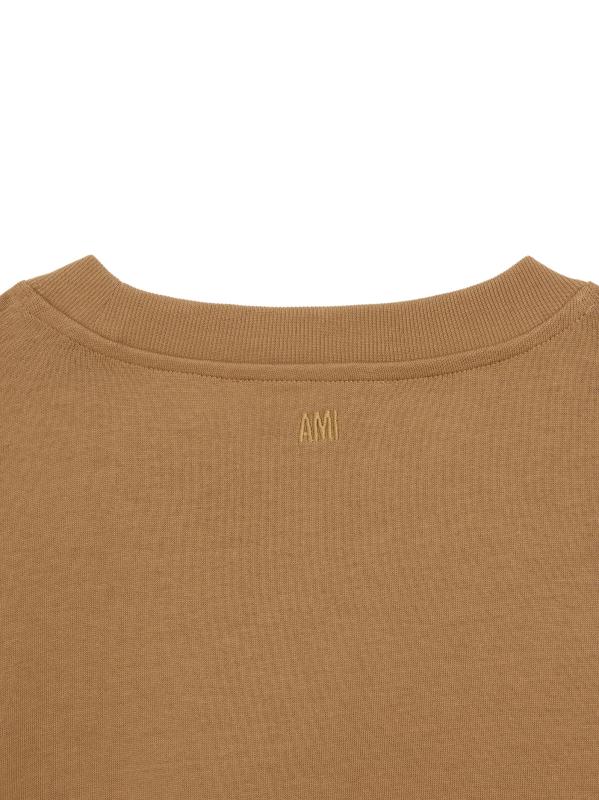 #2: تي شيرت بشعار أمي دي كور - الجمل