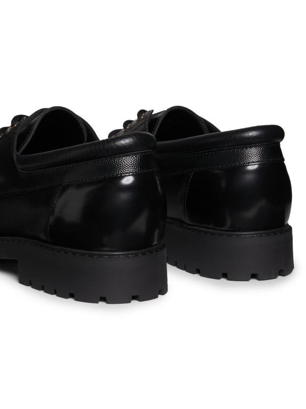 #3: أحذية القوارب الجلدية - أسود