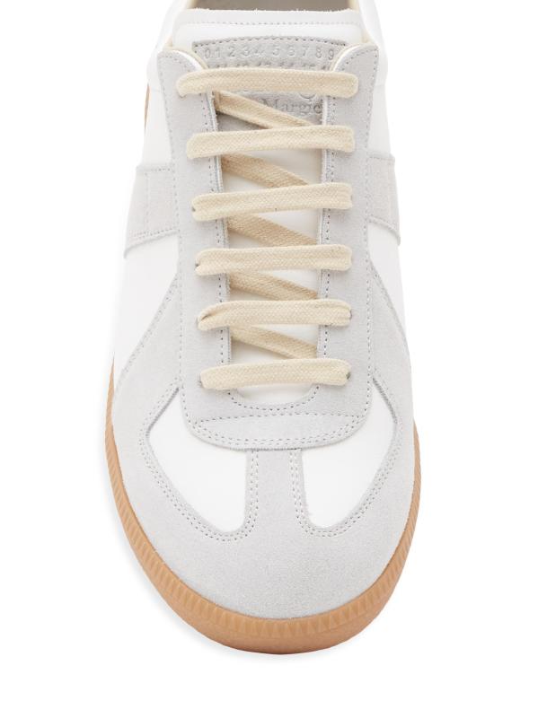 #5: حذاء رياضي من الجلد والجلد المدبوغ - أوف وايت