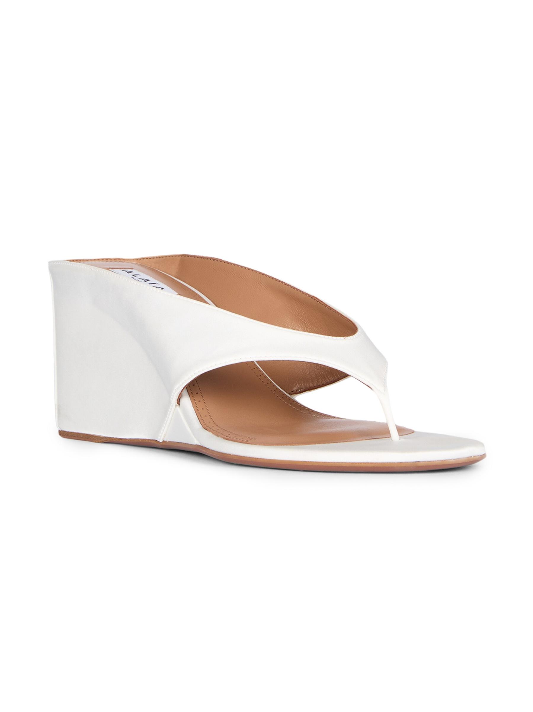【ALAIA直営店】MULES TONG COMPENSeES EN SATIN Shop Alaïa - 75MM Satin Wedge Tong Mules | Saks Fifth Avenue