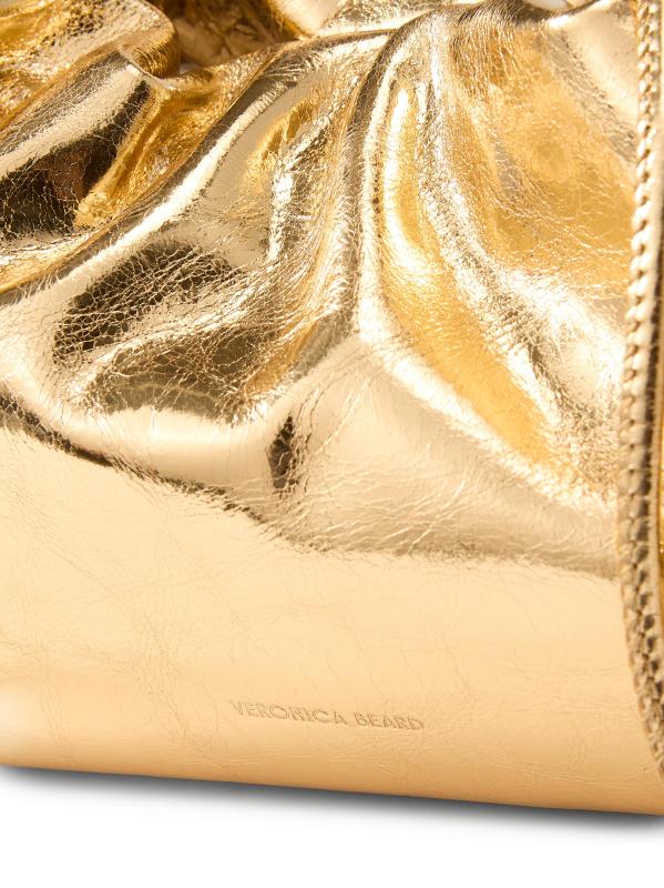 #6: حقيبة صغيرة من الجلد المعدني - الذهب