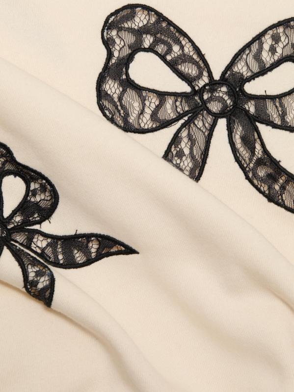 #6: سترة Linetta من الدانتيل بفيونكة - كريم