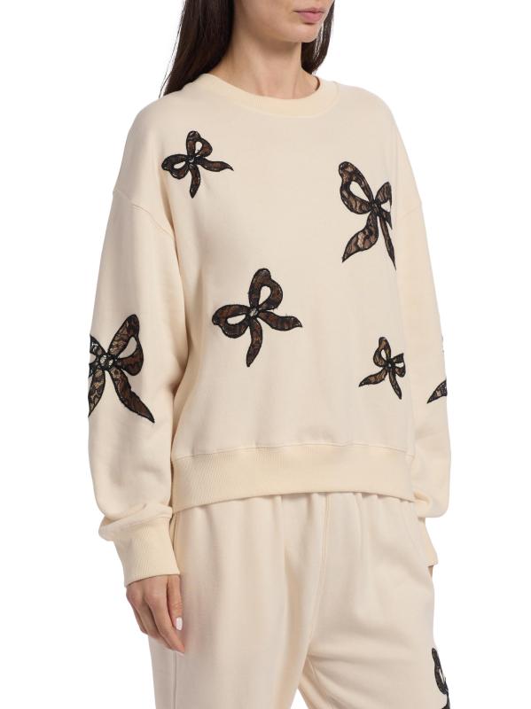 #3: سترة Linetta من الدانتيل بفيونكة - كريم