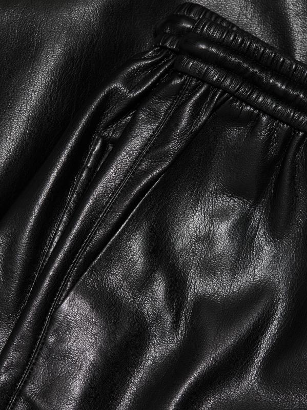 #6: سروال كالي من الجلد الصناعي من نانوشكا دولاب - أسود