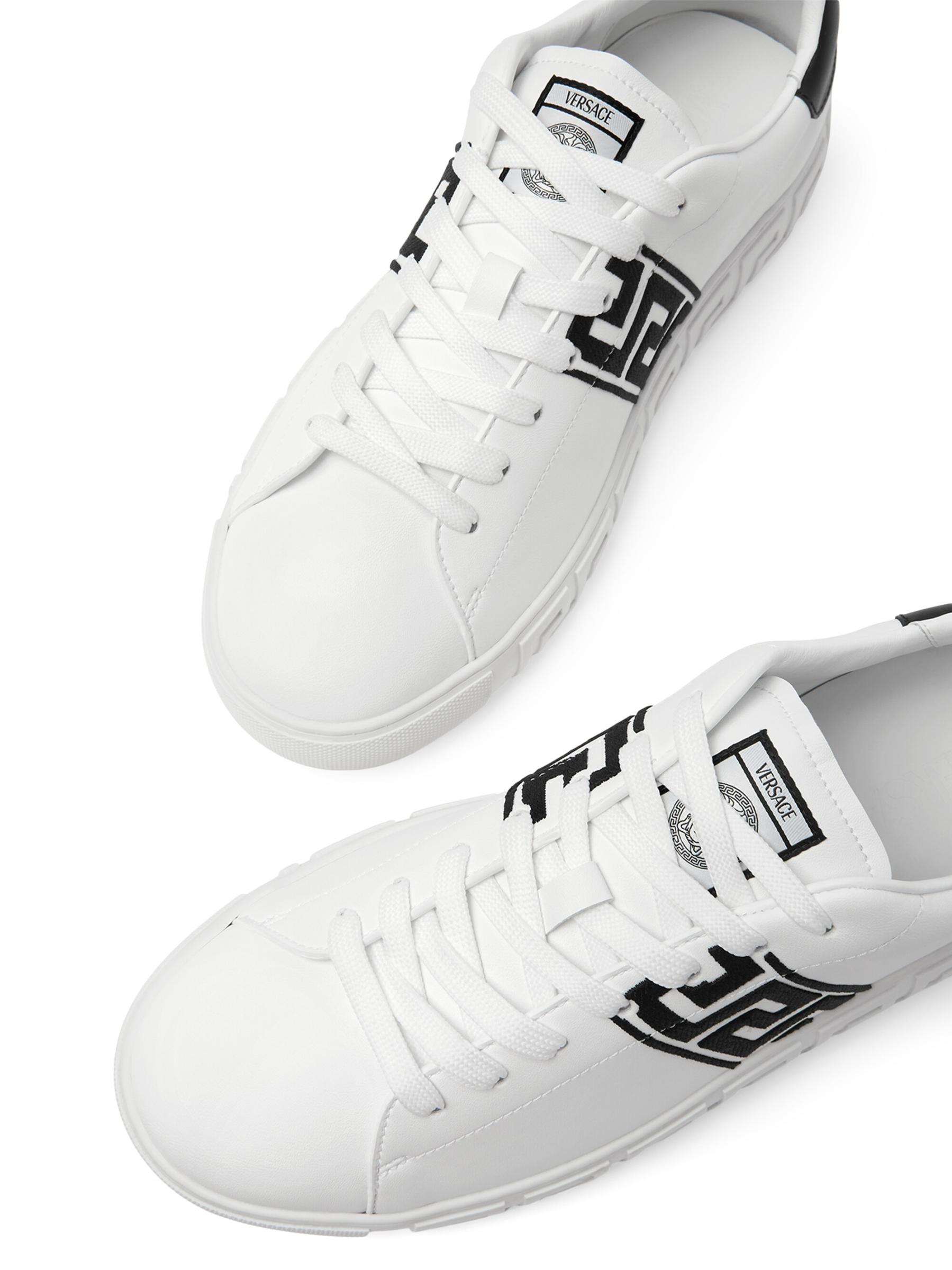 Shop Versace - Embroidered La Greca Leather Sneakers | Saks