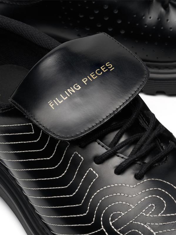 #4: أحذية ديربي لكرة القدم الجلدية - أسود