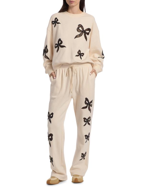 #7: سترة Linetta من الدانتيل بفيونكة - كريم