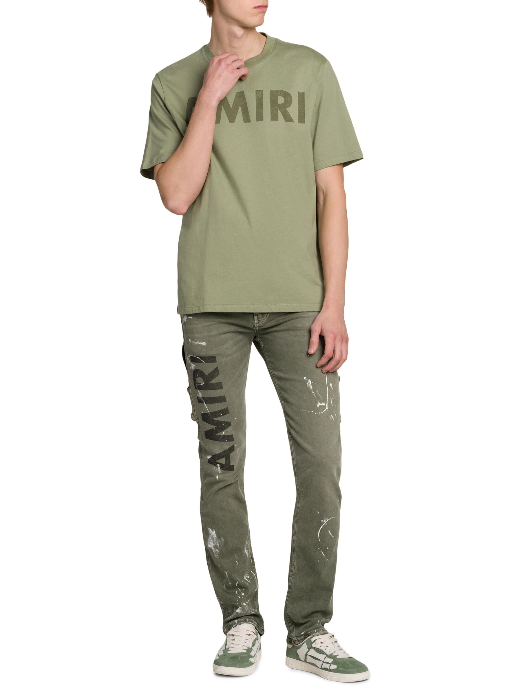 ★関税込★ AMIRI ステンシル Tシャツ Amiri - ロゴ・ステンシルTシャツ をオンライン購入 | Saks