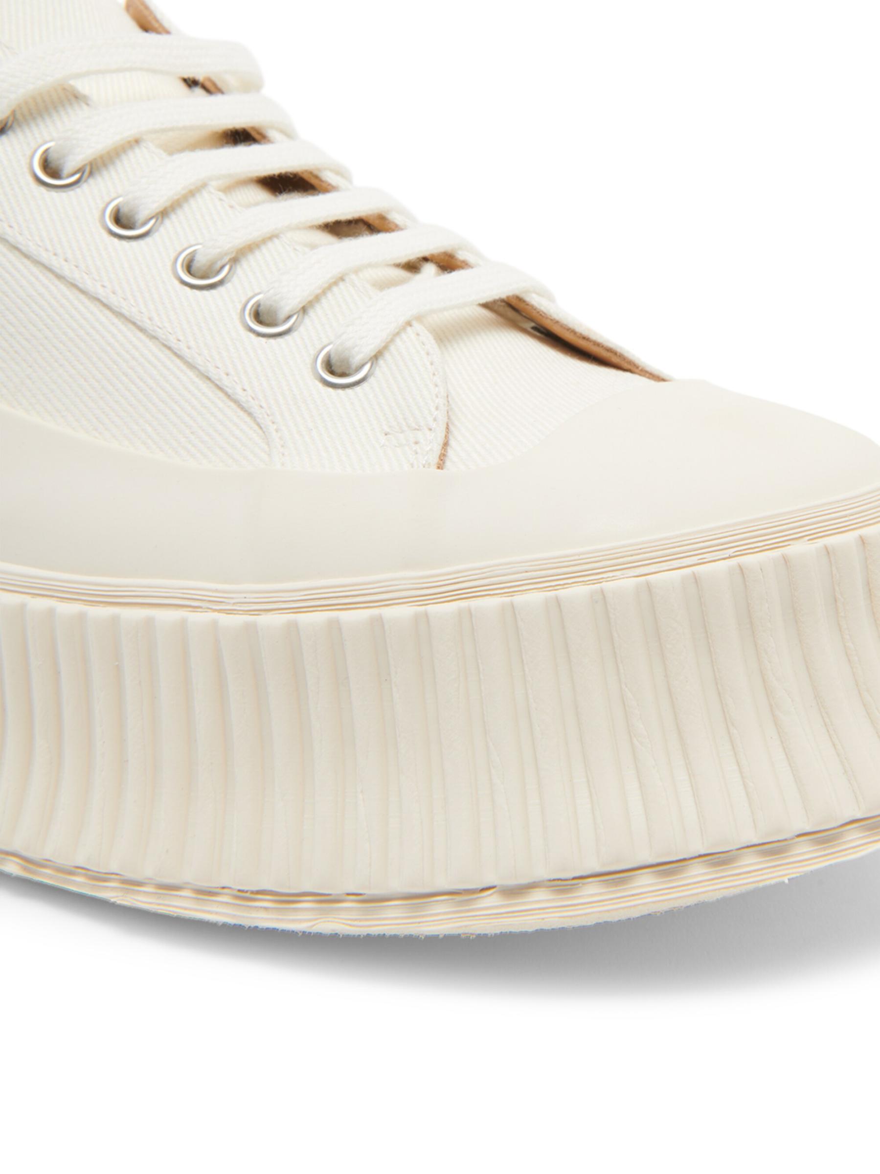 JIL SANDER パネル ロートップ スニーカー Jil Sander - レザーパネル付きロートップ・スニーカー を