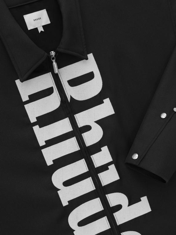 #3: جاكيت عمل من الصوف بشعار الماركة - أسود + أبيض