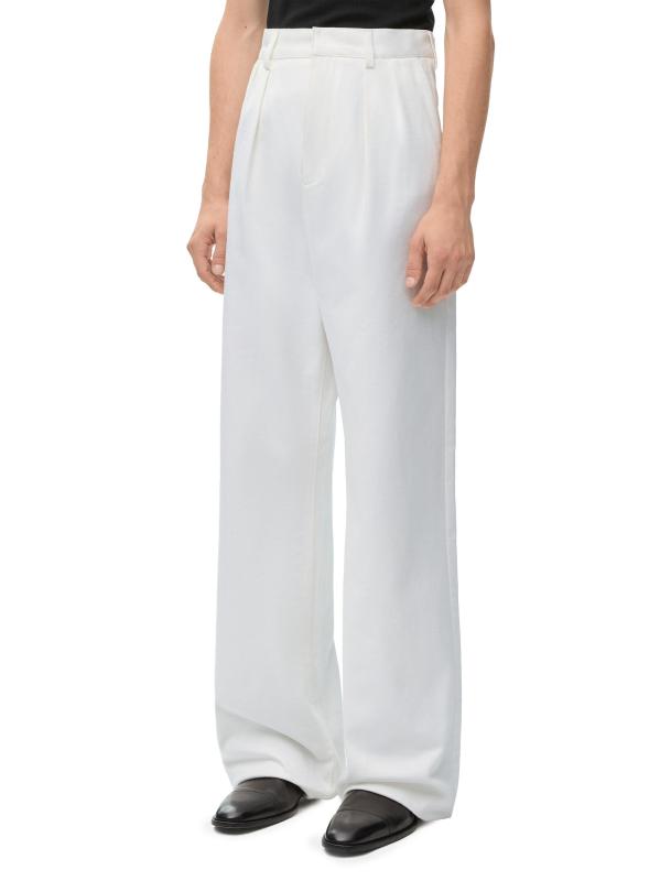 Compra Loewe Pantalón de pata ancha de algodón plisado Saks