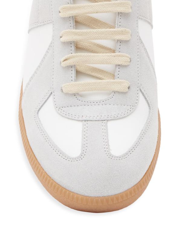 #4: حذاء رياضي من الجلد والجلد المدبوغ - أوف وايت